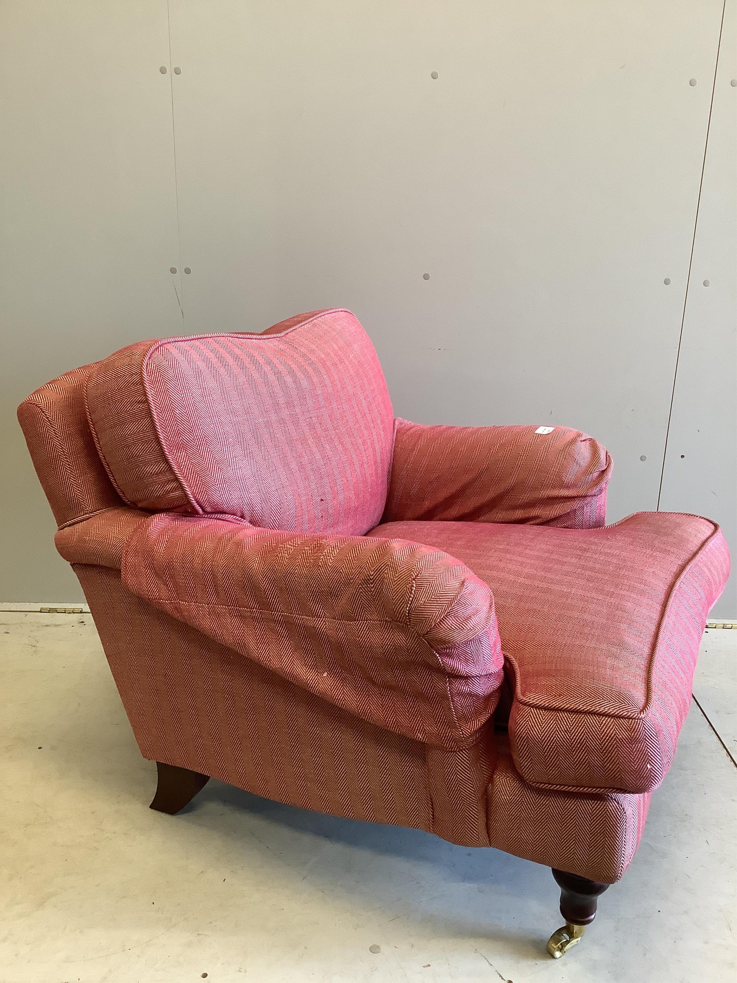 A modern Howard style upholstered armchair, width 90cm, depth 100cm, height 75cm. Condition - fair